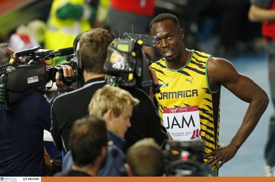 Bolt si gode il successo davanti alla telecamere. Action Images